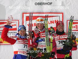01.01.2010, Oberhof, Germany (GER): podium, l-r: Natalia Korosteleva (RUS), Madshus, Rottefella, Swix, adidas, Petra Majdic (SLO), Fischer, Rottefella, Alpina, One Way, Justyna Kowalczyk (POL), Fischer, Salomon, Swix  - FIS world cup cross-country, tour de ski, prologue women, Oberhof (GER). www.nordicfocus.com. © Hemmersbach/NordicFocus. Every downloaded picture is fee-liable.