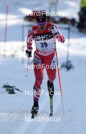 07.01.2010, Cortina-Toblach, Italy (ITA): George Grey (CAN), Fischer  - FIS world cup cross-country, tour de ski, 10km men, Cortina-Toblach (ITA). www.nordicfocus.com. © Hemmersbach/NordicFocus. Every downloaded picture is fee-liable.