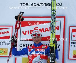 06.01.2010, Cortina-Toblach, Italy (ITA): todays winner and overall leader of the TdS Arianna Follis (ITA), Fischer, Salomon, Swix  - FIS world cup cross-country, tour de ski, 15km women handicap start, Cortina-Toblach (ITA). www.nordicfocus.com. © Hemmersbach/NordicFocus. Every downloaded picture is fee-liable.