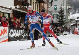 06.01.2010, Cortina-Toblach, Italy (ITA): group, l-r: Matti Heikkinen (FIN), Fischer, Rottefella, Alpina, Exel and Devon Kershaw (CAN), Fischer, Salomon, Swix  - FIS world cup cross-country, tour de ski, 30km men handicap start, Cortina-Toblach (ITA). www.nordicfocus.com. © Hemmersbach/NordicFocus. Every downloaded picture is fee-liable.
