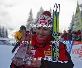 10.01.2010, Val di Fiemme, Italy (ITA): TdS overall winner Justyna Kowalczyk (POL), Fischer, Salomon, Swix  - FIS world cup cross-country, tour de ski, final climb women, Val di Fiemme (ITA). www.nordicfocus.com. © Hemmersbach/NordicFocus. Every downloaded picture is fee-liable.