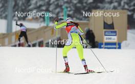 10.01.2010, Val di Fiemme, Italy (ITA): Petra Majdic (SLO), Fischer, Rottefella, Alpina, One Way, following Justyna Kowalczyk (POL), Fischer, Salomon, Swix  - FIS world cup cross-country, tour de ski, final climb women, Val di Fiemme (ITA). www.nordicfocus.com. © Felgenhauer/NordicFocus. Every downloaded picture is fee-liable.
