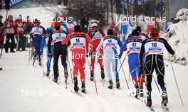 09.01.2010, Val di Fiemme, Italy (ITA): the chasing group in the uphill - FIS world cup cross-country, tour de ski, mass men, Val di Fiemme (ITA). www.nordicfocus.com. © Felgenhauer/NordicFocus. Every downloaded picture is fee-liable.