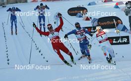 17.01.2010, Otepaeae, Estland (EST): group, photo finish, in front l-r: Ola Vigen Hattestad (NOR), Fischer, Rottefella, Swix, Nikita Kriukov (RUS), Rossignol, Rottefella, Swix, adidas and Emil Joensson (SWE), Fischer, Salomon, Craft  - FIS world cup cross-country, individual sprint, Otepaeae (EST). www.nordicfocus.com. © Hemmersbach/NordicFocus. Every downloaded picture is fee-liable.