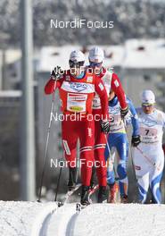 07.03.2010, Lahti, Finland (FIN): Eldar Roenning (NOR) followed by Simen Oestensen (NOR) - FIS world cup cross-country, 4x10km men, Lahti (FIN). www.nordicfocus.com. © Laiho/NordicFocus. Every downloaded picture is fee-liable.