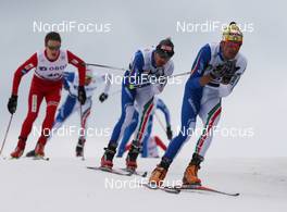 13.03.2010, Holmenkollen, Norway (NOR): group, l-r: Petter Eliassen (NOR), Fischer, Roland Clara (ITA), Madshus, Rottefella, Swix, Pietro Piller Cottrer (ITA), Rossignol, Rottefella, One Way, Yoko  - FIS world cup cross-country, 50km men, Holmenkollen (NOR). www.nordicfocus.com. © Hemmersbach/NordicFocus. Every downloaded picture is fee-liable.
