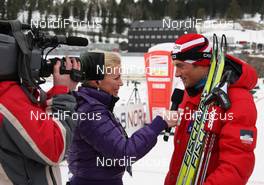 13.03.2010, Holmenkollen, Norway (NOR): Petter Northug (NOR), Fischer, Rottefella, Alpina, Ski Go, Swix  giving a tv-interview - FIS world cup cross-country, 50km men, Holmenkollen (NOR). www.nordicfocus.com. © Hemmersbach/NordicFocus. Every downloaded picture is fee-liable.