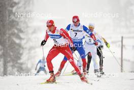 21.03.2010, Falun, Sweden (SWE): Dario Cologna (SUI), Fischer, Rottefella, Alpina, Swix, adidas, ahead of Lukas Bauer (CZE), Fischer, Rottefella, Alpina, Swix, Toko  - FIS world cup cross-country, 15km men handicap start, Falun (SWE). www.nordicfocus.com. Â© Felgenhauer/NordicFocus. Every downloaded picture is fee-liable.