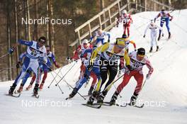 20.03.2010, Falun, Sweden (SWE): l-r: Roland Clara (ITA), Madshus, Rottefella, Swix, Jens Eriksson (SWE), Fischer, Salomon, Swix, Ivan Babikov (CAN), Salomon, One Way  - FIS world cup cross-country, pursuit men, Falun (SWE). www.nordicfocus.com. Â© Felgenhauer/NordicFocus. Every downloaded picture is fee-liable.