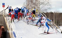 20.03.2010, Falun, Sweden (SWE): horror-crash over the bridge - FIS world cup cross-country, pursuit men, Falun (SWE). www.nordicfocus.com. © Felgenhauer/NordicFocus. Every downloaded picture is fee-liable.