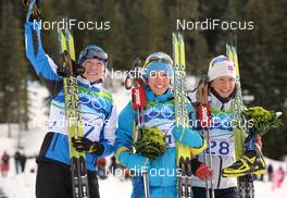 15.02.2010, Whistler, Canada (CAN): l-r: Kristina Smigun (EST), Fischer, Rottefella, Charlotte Kalla (SWE), Fischer, Salomon, Swix, Craft, Marit Bjoergen (NOR), Fischer, Rottefella, Swix  - Olympic Winter Games Vancouver 2010, cross-country, 10km women, Whistler (CAN). www.nordicfocus.com. © NordicFocus. Every downloaded picture is fee-liable.