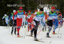 28.02.2010, Whistler, Canada (CAN): l-r: Odd-Bjoern Hjelmeset (NOR), Rossignol, Rottefella, One Way, Ivan Babikov (CAN), Salomon, One Way, Rene Sommerfeldt (GER), Madshus, Salomon, Leki, adidas  - Olympic Winter Games Vancouver 2010, cross-country, mass men, Whistler (CAN). www.nordicfocus.com. © NordicFocus. Every downloaded picture is fee-liable.