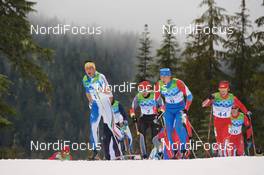 28.02.2010, Whistler, Canada (CAN): l-r: Pietro Piller Cottrer (ITA), Rossignol, Rottefella, One Way, Yoko, Alexander Legkov (RUS), Madshus, Rottefella, Swix, adidas  - Olympic Winter Games Vancouver 2010, cross-country, mass men, Whistler (CAN). www.nordicfocus.com. © NordicFocus. Every downloaded picture is fee-liable.