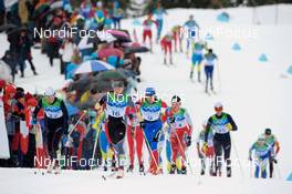 27.02.2010, Whistler, Canada (CAN): l-r: Karine Laurent Philippot (FRA), Rossignol, Rottefella, One Way, Odlo, Katrin Zeller (GER), Rossignol, Rottefella, One Way, adidas, Olga Savialova (RUS), Atomic, Rottefella, Alpina, Swix, adidas  - Olympic Winter Games Vancouver 2010, cross-country, mass women, Whistler (CAN). www.nordicfocus.com. © NordicFocus. Every downloaded picture is fee-liable.