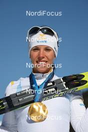 18.02.2010, Whistler, Canada (CAN): medal, Charlotte Kalla (SWE), Fischer, Salomon, Swix, Craft  - Olympic Winter Games Vancouver 2010, cross-country, medals, Whistler (CAN). www.nordicfocus.com. © NordicFocus. Every downloaded picture is fee-liable.