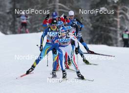 20.11.2010, Gaellivare, Sweden (SWE): Group, in front: Valerio Checchi (ITA), Fischer, Salomon, Swix, Rudy Project  - FIS world cup cross-country, 15km men, Gaellivare (SWE). www.nordicfocus.com. © Hemmersbach/NordicFocus. Every downloaded picture is fee-liable.