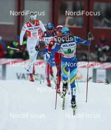 21.11.2010, Gaellivare, Sweden (SWE): group, in front: Alexey Poltaranin (KAZ), Fischer, Salomon, Swix  - FIS world cup cross-country, 4x10km men, Gaellivare (SWE). www.nordicfocus.com. © Hemmersbach/NordicFocus. Every downloaded picture is fee-liable.