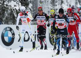 21.11.2010, Gaellivare, Sweden (SWE): group, l-r: Mats Larsson (SWE), Fischer, One Way, Craft, Jens Filbrich (GER), Rossignol, Rottefella, One Way, adidas, Sami Jauhojaervi (FIN), Fischer, Rottefella, Swix, Eldar Roenning (NOR), Rossignol, Rottefella, Swix  - FIS world cup cross-country, 4x10km men, Gaellivare (SWE). www.nordicfocus.com. © Hemmersbach/NordicFocus. Every downloaded picture is fee-liable.