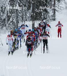 21.11.2010, Gaellivare, Sweden (SWE): group, in front, l-r: Mats Larsson (SWE), Fischer, One Way, Craft, Sami Jauhojaervi (FIN), Fischer, Rottefella, Swix, Mathias Fredriksson (SWE), Salomon, Swix  - FIS world cup cross-country, 4x10km men, Gaellivare (SWE). www.nordicfocus.com. © Hemmersbach/NordicFocus. Every downloaded picture is fee-liable.