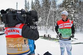 19.11.2010, Gaellivare, Sweden (SWE): Marcus Hellner (SWE), Fischer, Salomon, Exel, Craft in the focus of the German TV (ZDF) - FIS world cup cross-country, training, Gaellivare (SWE). www.nordicfocus.com. © Hemmersbach/NordicFocus. Every downloaded picture is fee-liable.