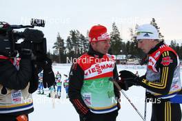 19.11.2010, Gaellivare, Sweden (SWE): Group, l-r: Kuno Schreyl (GER), Headcoach Men, Team Germany and Tim Tscharnke (GER), Fischer in the focus of the German TV (ZDF) - FIS world cup cross-country, training, Gaellivare (SWE). www.nordicfocus.com. © Hemmersbach/NordicFocus. Every downloaded picture is fee-liable.