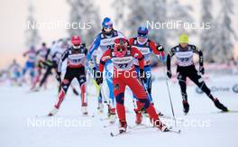 28.11.2010, Kuusamo, Finland (FIN): Ingvill Flugstad Oestberg (NOR), Madshus, Rottefella, Swix, leads a big group - FIS world cup cross-country, 10km women handicap start, Kuusamo (FIN). www.nordicfocus.com. Â© Felgenhauer/NordicFocus. Every downloaded picture is fee-liable.