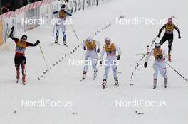 04.12.2010, Duesseldorf, Germany (GER): Finish of the semi final, l-r: Nicole Fessel (GER), Rossignol, Rottefella, Alpina, One Way, adidas, Hanna Falk (SWE), Atomic, Swix, Craft, Hanna Brodin (SWE), Madshus, Craft - FIS world cup cross-country, individual sprint, Duesseldorf (GER). www.nordicfocus.com. © Hemmersbach/NordicFocus. Every downloaded picture is fee-liable.