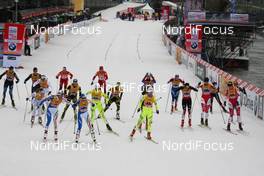 05.12.2010, Duesseldorf, Germany (GER): feature, exchange in the womens final, in front on the right: Magda Genuin (ITA), Rossignol, Rottefella, One Way and Arianna Follis (ITA), Fischer, Salomon, Swix  - FIS world cup cross-country, team sprint, Duesseldorf (GER). www.nordicfocus.com. © Hemmersbach/NordicFocus. Every downloaded picture is fee-liable.
