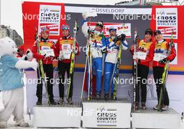 05.12.2010, Duesseldorf, Germany (GER): podium, l-r: 2nd Maiken Caspersen Falla (NOR) and Celine Brun-Lie (NOR), Fischer, Rottefella, Alpina, Swix, 1st Magda Genuin (ITA), Rossignol, Rottefella, One Way and Arianna Follis (ITA), Fischer, Salomon, Swix, 3rd Daria Gaiazova (CAN) and Chandra Crawford (CAN), Fischer, Rottefella, Swix  - FIS world cup cross-country, team sprint, Duesseldorf (GER). www.nordicfocus.com. © Hemmersbach/NordicFocus. Every downloaded picture is fee-liable.