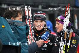 05.12.2010, Duesseldorf, Germany (GER): Group, l-r: Denise Herrmann (GER), Atomic, adidas, Swix, Alpina, Rottefella and Nicole Fessel (GER), Rossignol, Rottefella, Alpina, One Way, adidas during TV Interview (ARD) - FIS world cup cross-country, team sprint, Duesseldorf (GER). www.nordicfocus.com. © Hemmersbach/NordicFocus. Every downloaded picture is fee-liable.