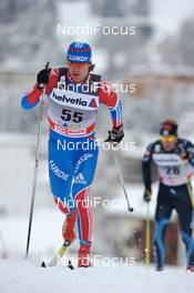 11.12.2010, Davos, Switzerland (SUI): Maxim Vylegzhanin (RUS), Fischer, Rottefella, Alpina, Swix, adidas  - FIS world cup cross-country, 15km men, Davos (SUI). www.nordicfocus.com. Â© Felgenhauer/NordicFocus. Every downloaded picture is fee-liable.