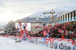 11.12.2010, Davos, Switzerland (SUI): spectators shouting for Dario Cologna (SUI), Fischer, Rottefella, Alpina, Swix, Odlo  - FIS world cup cross-country, 15km men, Davos (SUI). www.nordicfocus.com. Â© Felgenhauer/NordicFocus. Every downloaded picture is fee-liable.