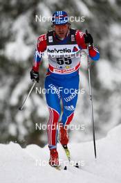 11.12.2010, Davos, Switzerland (SUI):  Maxim Vylegzhanin (RUS), Fischer, Rottefella, Alpina, Swix, adidas - FIS world cup cross-country, 15km men, Davos (SUI). www.nordicfocus.com. © Laiho/NordicFocus. Every downloaded picture is fee-liable.
