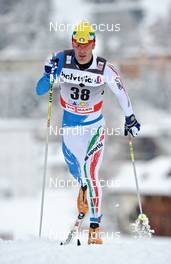 11.12.2010, Davos, Switzerland (SUI): Pietro Piller Cottrer (ITA), Rossignol, Rottefella, One Way, Yoko  - FIS world cup cross-country, 15km men, Davos (SUI). www.nordicfocus.com. Â© Felgenhauer/NordicFocus. Every downloaded picture is fee-liable.
