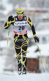 11.12.2010, Davos, Switzerland (SUI): Christophe Perrillat (FRA), Atomic, Salomon, One Way   - FIS world cup cross-country, 15km men, Davos (SUI). www.nordicfocus.com. Â© Felgenhauer/NordicFocus. Every downloaded picture is fee-liable.
