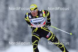 12.12.2010, Davos, Switzerland (SUI): Cyril Miranda (FRA), Fischer, Salomon, One Way, Julbo  - FIS world cup cross-country, individual sprint, Davos (SUI). www.nordicfocus.com. © Laiho/NordicFocus. Every downloaded picture is fee-liable.