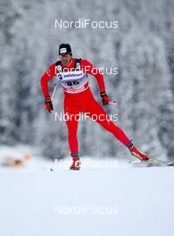 12.12.2010, Davos, Switzerland (SUI): Andreas Waldmeier (SUI), Fischer, Rottefella, Exel  - FIS world cup cross-country, individual sprint, Davos (SUI). www.nordicfocus.com. © Laiho/NordicFocus. Every downloaded picture is fee-liable.