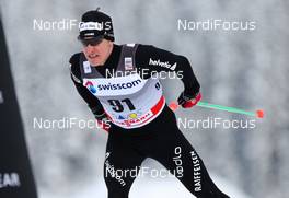 12.12.2010, Davos, Switzerland (SUI): Remo Fischer (SUI), Fischer, Rottefella, Alpina, KV+, ODLO  - FIS world cup cross-country, individual sprint, Davos (SUI). www.nordicfocus.com. © Laiho/NordicFocus. Every downloaded picture is fee-liable.