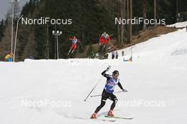 10.04.2010, Davos, Switzerland (SUI): Petter Northug (NOR), Fischer, Rottefella, Alpina, Ski Go, Swix  leads Joeri Kindschi (SUI) and Julian Eberhard (AUT) - Red Bull NordiX Davos-Bolgen, Davos (SUI). www.nordicfocus.com. © Manzoni/NordicFocus. Every downloaded picture is fee-liable.