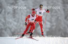 02.01.2010, Oberhof, Germany (GER): l-r: Bill Demong (USA), Atomic, Christoph Bieler (AUT), Atomic, Leki  - FIS world cup nordic combined, individual gundersen HS140/10km, Oberhof (GER). www.nordicfocus.com. © Felgenhauer/NordicFocus. Every downloaded picture is fee-liable.