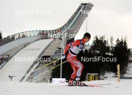 13.03.2010, Holmenkollen, Norway (NOR): Norihito Kobayashi (JPN), Madshus, Rottefella, in front of jumping hill - FIS world cup nordic combined, team HS134/4x5km, Holmenkollen (NOR). www.nordicfocus.com. © Felgenhauer/NordicFocus. Every downloaded picture is fee-liable.