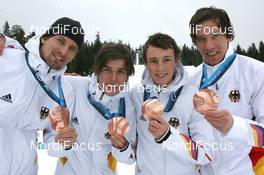 24.02.2010, Whistler, Canada (CAN): Team Germany with (L-R) Bjoern Kircheisen (GER), Fischer, Rottefella, Johannes Rydzek (GER), Eric Frenzel (GER), Fischer, Salomon, adidas, Tino Edelmann (GER), Elan, Madshus, Rottefella, adidas - Olympic Winter Games Vancouver 2010, nordic combined, medals, Whistler (CAN). www.nordicfocus.com. © NordicFocus. Every downloaded picture is fee-liable.