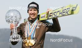 21.03.2010, Planica, Slovenia (SLO):Simon Ammann (SUI), Fischer  - FIS world championship ski flying, medals, Planica (SLO). www.nordicfocus.com. © Domanski/NordicFocus. Every downloaded picture is fee-liable.