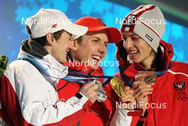13.02.2010, Whistler, Canada (CAN):l-r: Adam Malysz (POL), Fischer, Simon Ammann (SUI), Fischer, Gregor Schlierenzauer (AUT), Fischer   - Olympic Winter Games Vancouver 2010, ski jumping, medals, Whistler (CAN). www.nordicfocus.com. © NordicFocus. Every downloaded picture is fee-liable.