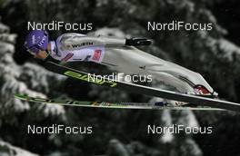 01.12.2010, Kuopio, Finland (FIN):  Martin Schmitt (GER), Elan - FIS world cup ski jumping, individual HS127, Kuopio (FIN). www.nordicfocus.com. © Laiho/NordicFocus. Every downloaded picture is fee-liable.