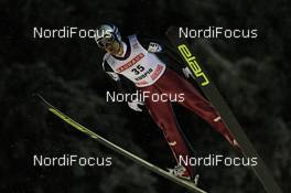 01.12.2010, Kuopio, Finland (FIN): Wolfgang Loitzl (AUT), Elan  - FIS world cup ski jumping, individual HS127, Kuopio (FIN). www.nordicfocus.com. © Laiho/NordicFocus. Every downloaded picture is fee-liable.