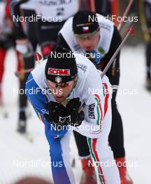 07.03.2010, Mora, Sweden (SWE): group, in front Marco Cattaneo (ITA), Swix, Ski Trab, Rudy Project, behind Stanislav Rezac (CZE), Fischer  - Worldloppet / FIS Marathon Cup Vasaloppet, Mora (SWE). www.nordicfocus.com. © Hemmersbach/NordicFocus. Every downloaded picture is fee-liable.
