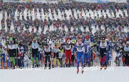 07.03.2010, Mora, Sweden (SWE): feature, group, the elite group leads the 18000 competitors out of the start area - Worldloppet / FIS Marathon Cup Vasaloppet, Mora (SWE). www.nordicfocus.com. © Hemmersbach/NordicFocus. Every downloaded picture is fee-liable.