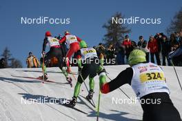 14.03.2010, Scuol, Switzerland (SUI): Dario Cologna (SUI), Fischer, Rottefella, Alpina, Swix, adidas leads Oskar Svaerd (SWE), Atomic; Jerry Ahrlin (SWE), Madshus, Rottefella - FIS Marathon Cup Engadin Skimarathon, Scuol (SUI). www.nordicfocus.com. © Manzoni/NordicFocus. Every downloaded picture is fee-liable.