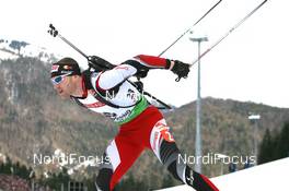 12.01.2011, Ruhpolding, Germany (GER): Simon Eder (AUT), Fischer, Rottefella, Swix - IBU world cup biathlon, individual men, Ruhpolding (GER). www.nordicfocus.com. © Manzoni/NordicFocus. Every downloaded picture is fee-liable.